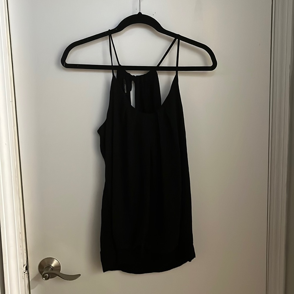 Super cute tank top adjustable strap dress up or down. Maurice’s size large